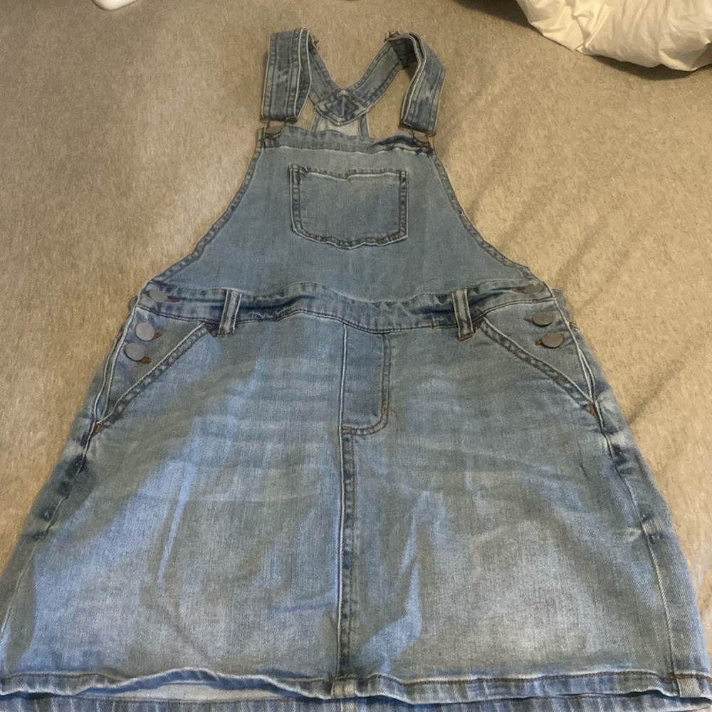 Never worn skirt overalls. Blue Jean material super soft.